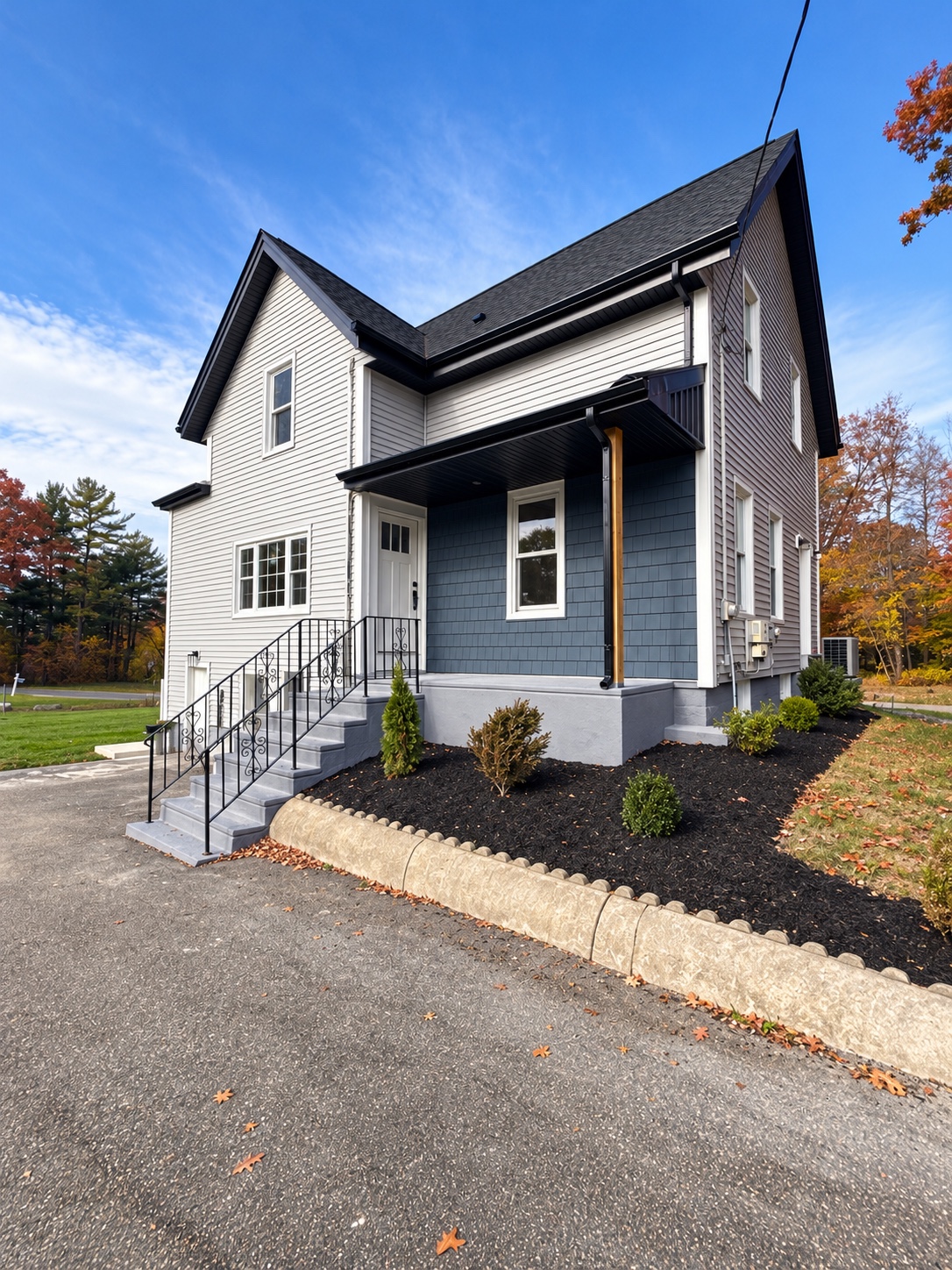 Front porch and entryway of the featured J. Brown Realty listing in Brockton